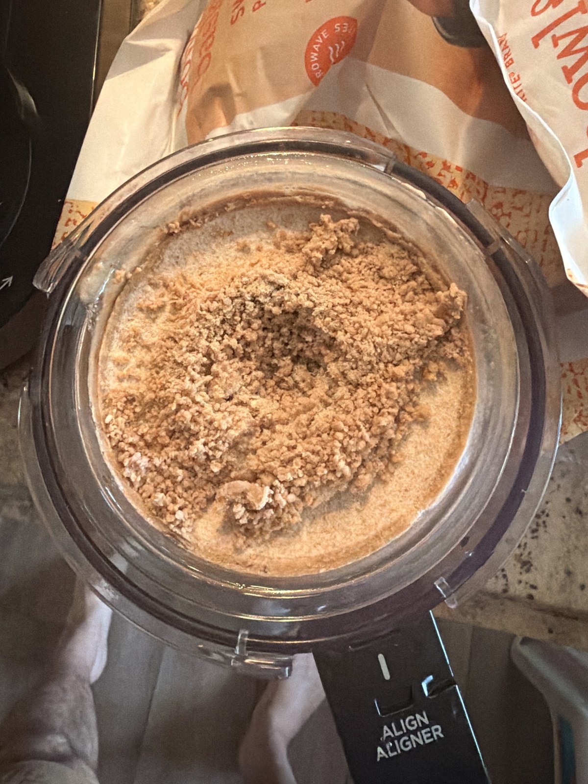 Pale, dry, crumbly pint of ice cream right after the first spin