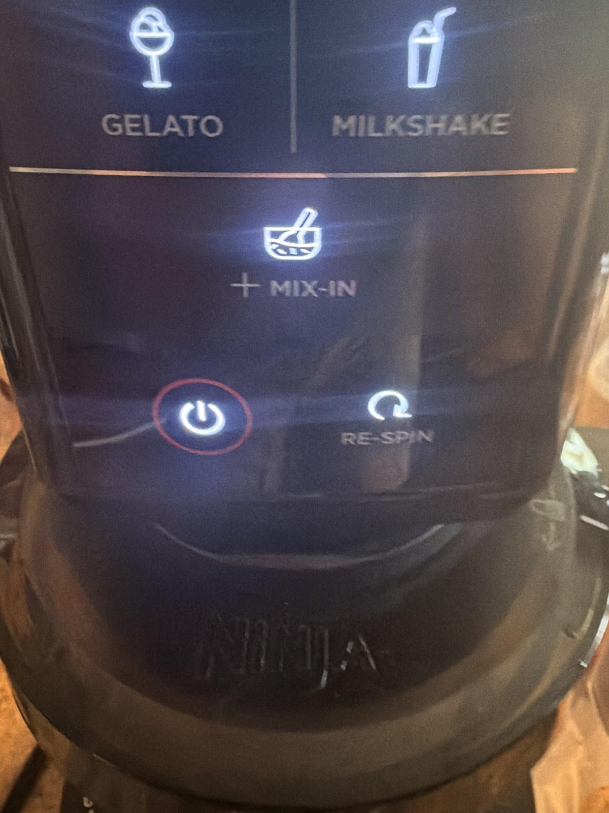 Ninja Creami control panel with the Re-spin button